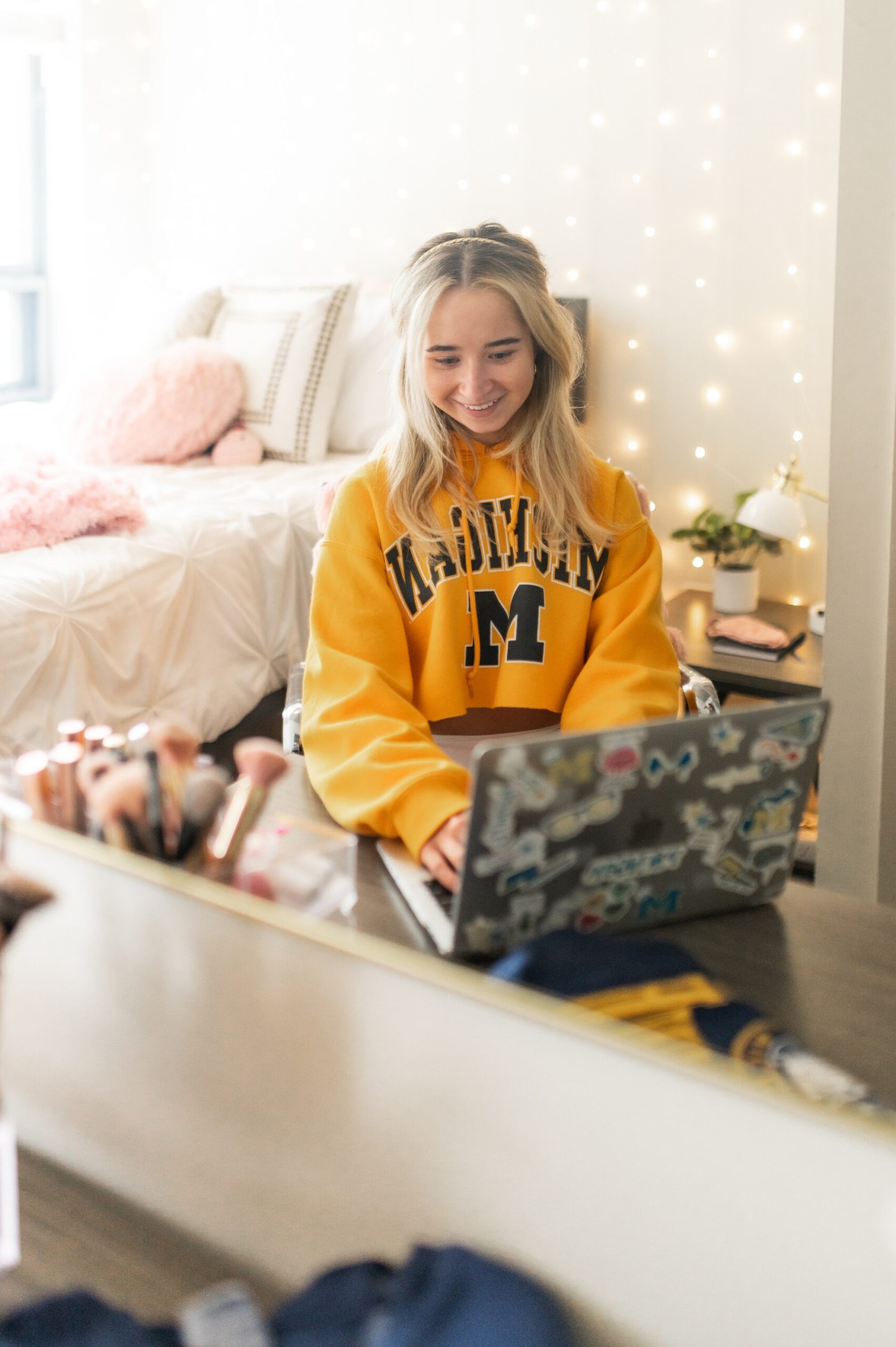 Girl studying in her bedroom at Six11 apartments